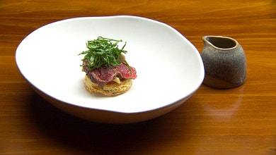 Beef Tataki Wellington with Shimeji Mushrooms, Horseradish and Spicy Black Pepper Sauce