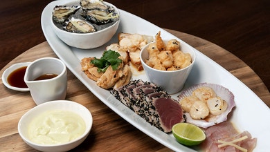 Steamed Miso Snapper, Miso Poached Bugs, Popcorn Shrimp, King Fish Sashimi, Oysters and Pan Seared Scollops