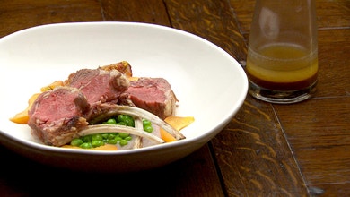 Lamb Rack with Red Onion Puree and Sauteed Peas
