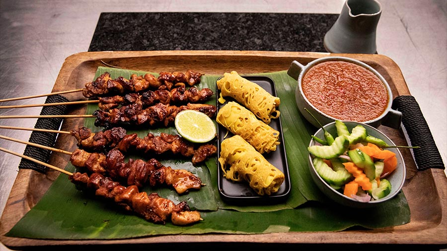 Indonesian Chicken Satay, Cucumber Pickle and Roti Jala
