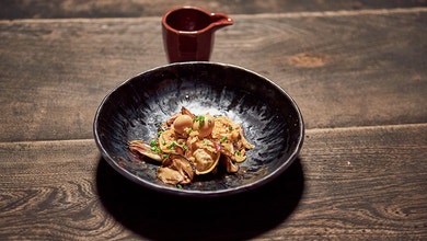 Pork Dumplings with Spicy Broth and Soy Quail Eggs