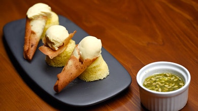 Blue Cheese Ice Cream on Morel Cone with Buddha’s Fingers Sponge and Horn Melon Syrup