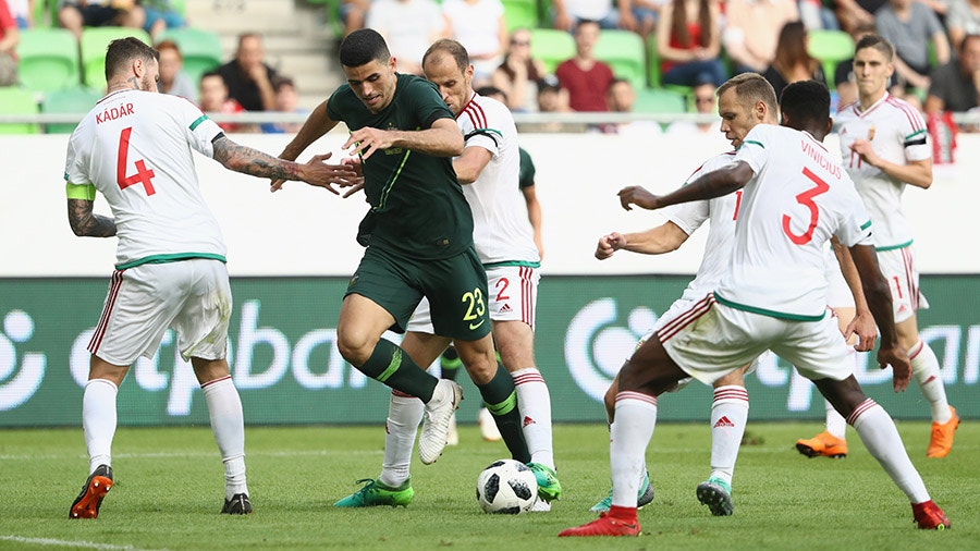 Tomi Juric of Australia is challenged by his opponents.