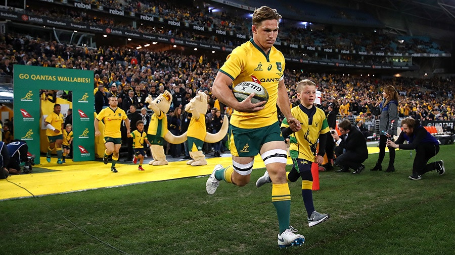 Michael Hooper leads team mates onto the field