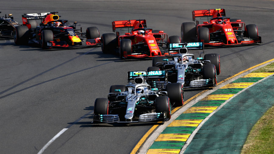 Valtteri Bottas driving the Mercedes AMG Petronas F1 Team Mercedes W10 leads Lewis Hamilton of Great Britain