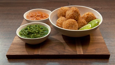 Bacon and Corn Croquettes with Salsa Brava and Mojo Verde 