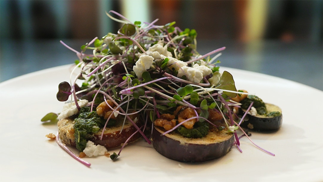 Fried Eggplant with Salsa Verde, Candied Walnuts and Goats Cheese