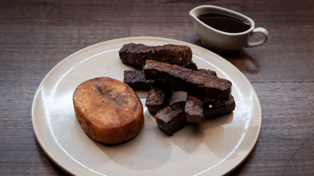Potato Steak with Wagu Chips and Pepper Sauce