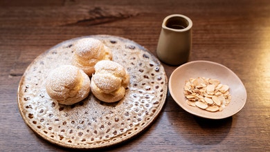 Vanilla Almond Profiterole with Butterscotch Sauce and Toasted Almonds