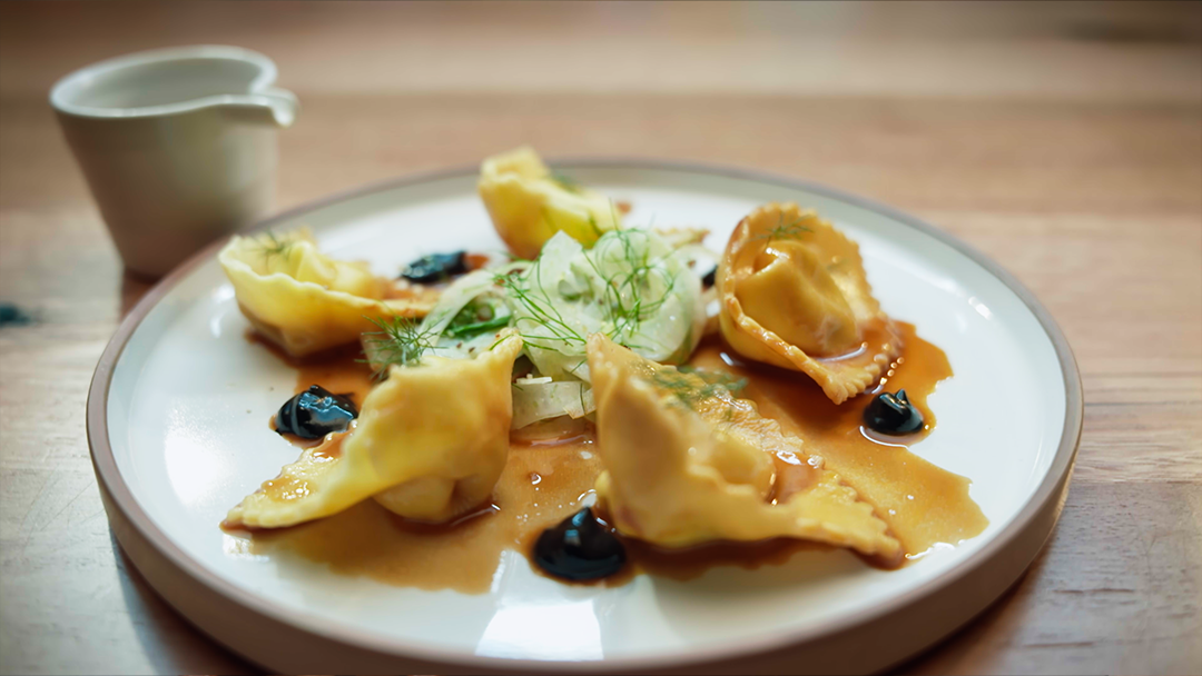 Scallop Cappellacci, Braised Fennel, Squid Ink Emulsion, Prawn Bisque Sauce, Fennel Salad