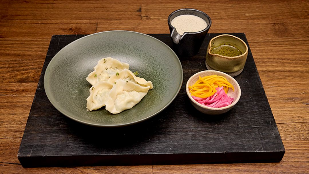 Lobster Dumplings, Pickles Daikon and Honeynut Squash with Yoghurt Seaweed Tapenade Vinaigrette Dressing