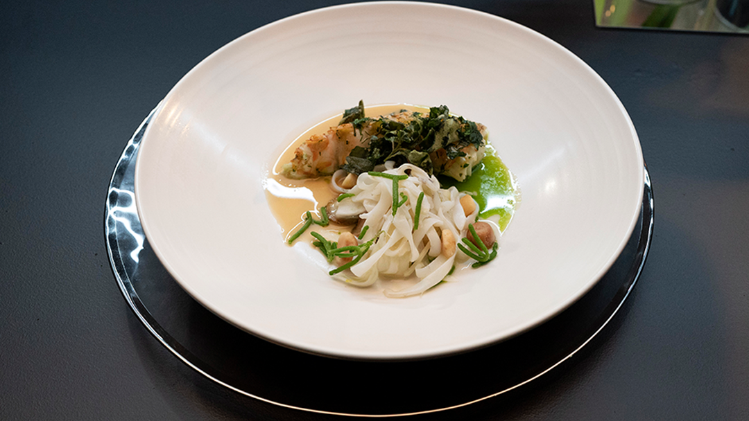 Lobster Roasted with Saltbush Butter, Kipfler Potato, Calamari, Lobster Head and Goolwa Pipi Sauce