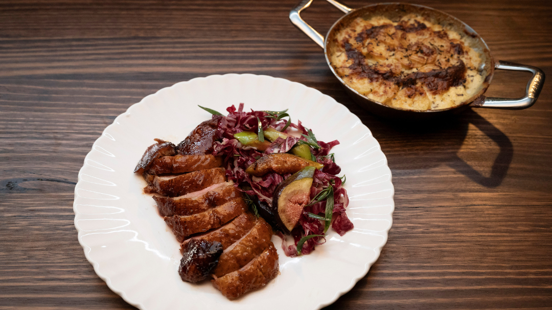 Glazed Duck Breast With Potato, Goat’s Cheese, Tarragon & Fresh Truffle Gratin, Brown Butter Fig And Radicchio Salad