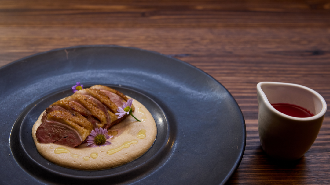 Duck Roasted On The Crown, Macadamia And Black Garlic Puree, Ooray Sauce